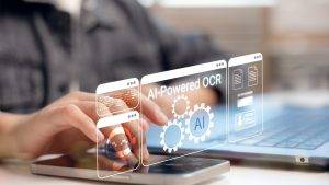 Person using AI-powered OCR technology on smartphone and laptop with virtual interface, representing intelligent document scanning, text recognition, and automation processing tools.