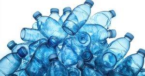 heap of empty blue plastic water bottles with caps, crushed and overlapping on a white background, evoking waste and environmental concern